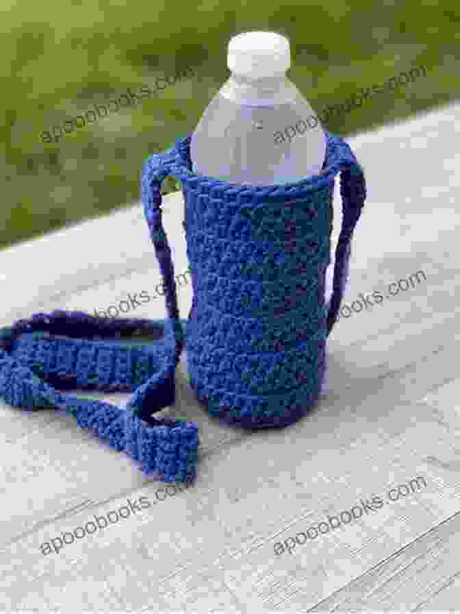 A Close Up Of The Water Bottle Holder Little Purse Crochet Pattern, Showcasing Its Intricate Design And Functionality. Water Bottle Holder Little Purse Crochet Pattern