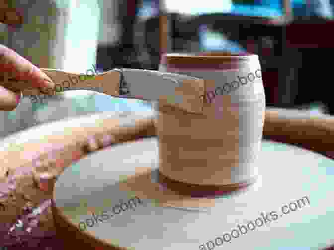 A Potter Glazing A Ceramic Bowl In Her Studio An To Appalachian Music Crafts