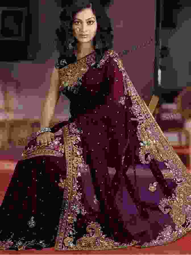 A Traditional Indian Woman Adorned In A Gold And Silver Embellished Sari Jewelled Textile Gold And Silver Embellished Cloth Of India