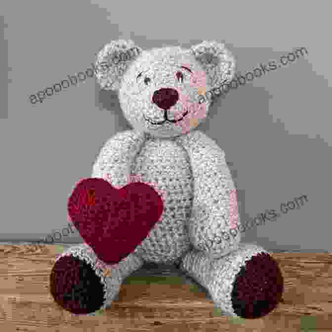 An Endearing Crocheted Teddy Bear Holding A Sweet Treat, Showcasing The Adorable Patterns Available In Easy Amigurumi: 28 Doll Patterns (Sayjai S Amigurumi Crochet Patterns 1)